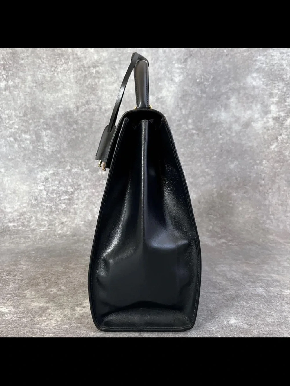 Gucci Black Leather Top-Handle Satchel with Gold Hardware Accent